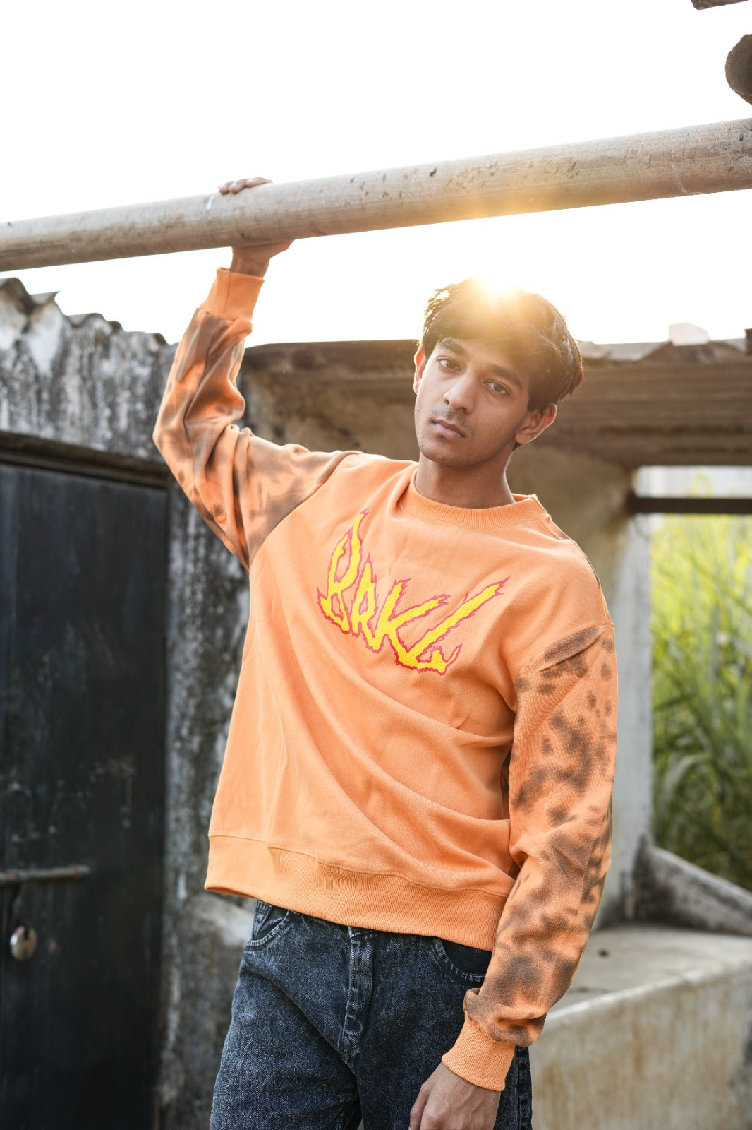 Burnt Clay Combo  (Orange graphic sweatshirt + Charcoal jeans)